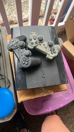 PlayStation 3 And 2 Controllers And games
