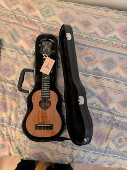 As new KoAloha KSM 00 Soprano ukulele with Gator hard case