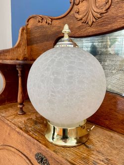 MCM style frosted glass sphere shade with gold tone metal base and finial. Has electric wires attached.