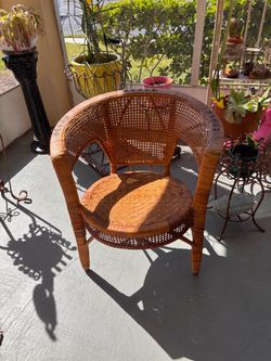 Vintage MCM  Bohemian Coastal Rattan and Wicker Barrel Armchair with a Rounded Wraparound Back