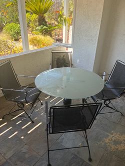 Round Glass Top Patio Table with 4 Chairs