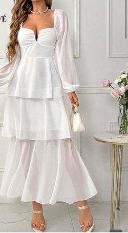 White dress never used. Size small.