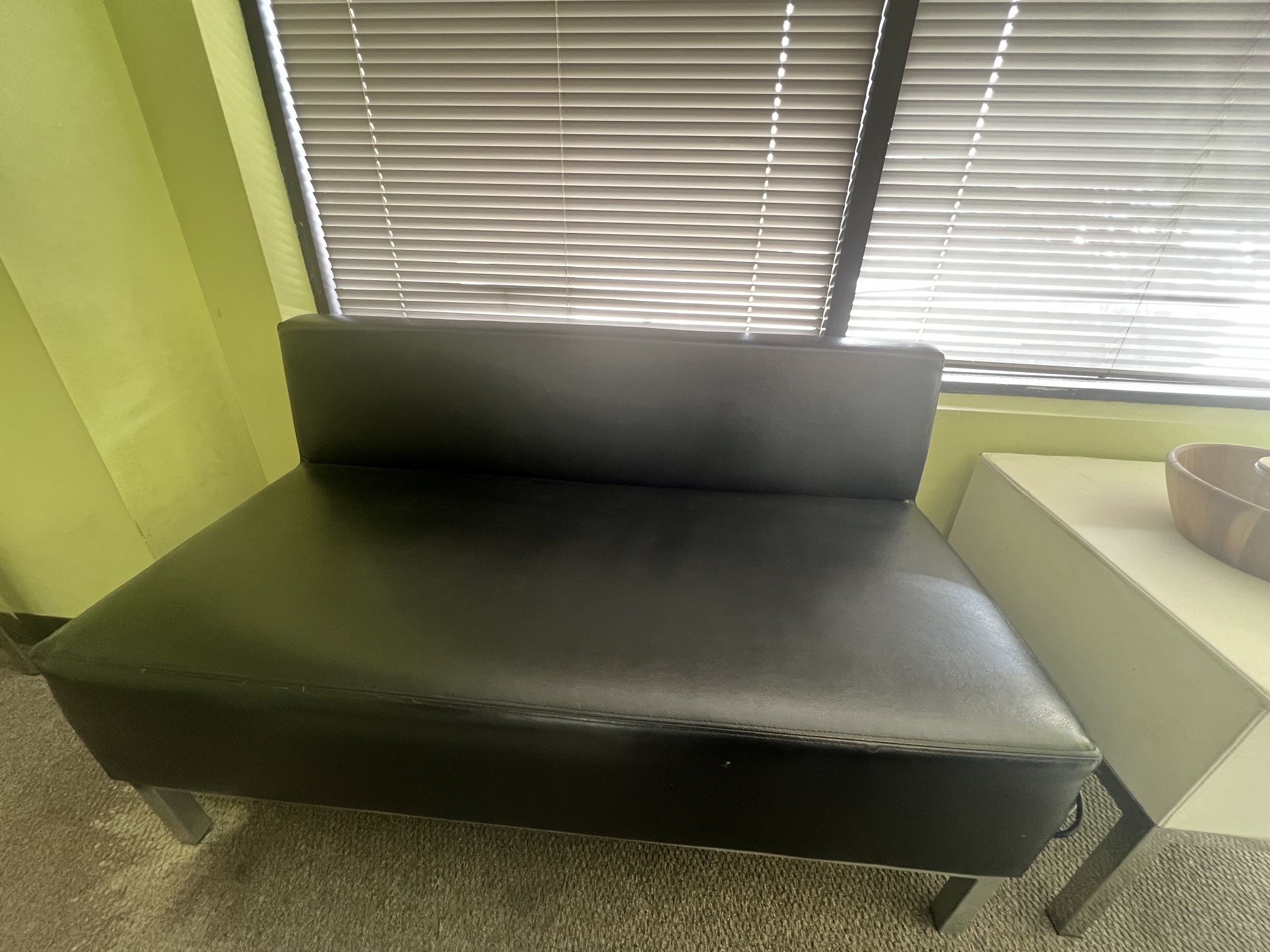 3 black sofas