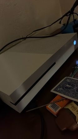 Xbox one one terabyte hard drive with two controllers almost brand new