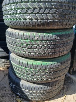 215 70 15 Ford roller tires on 5 Bolt Hole wheel rims