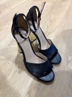 Black and gold heels
