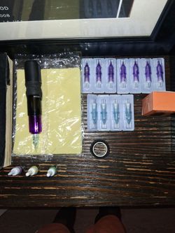 Tattoo Gun With Ink, Practice Skin, Extra Battery, And Needles