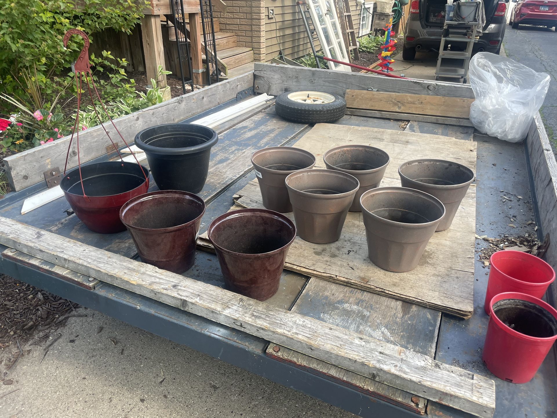 Plant Pots, 7 are 8 inch , 2 are 12 inch wide, 2 are 6 inch, $10 for all