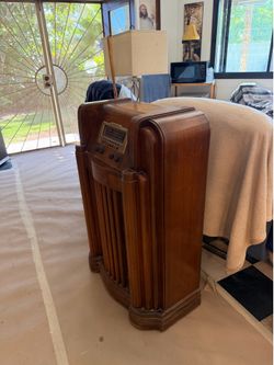 Two pieces of vintage furniture with radio