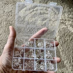 New silver tone nail embellishments