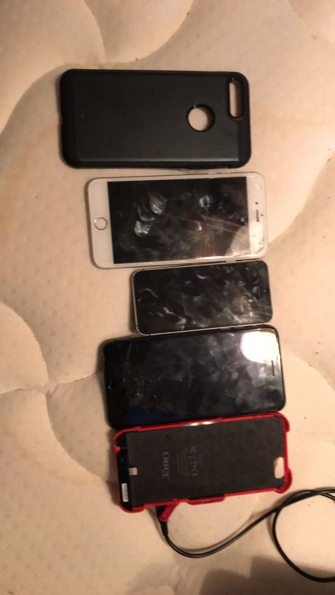 4 iPhones total. READ