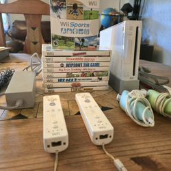 Wii Family Bundle. Wii Sports,  Console, 9 Games, 2 Controllers, Nunchuck Controllers