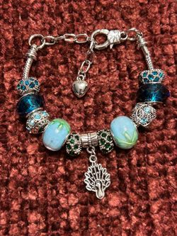Beautiful Tiel Peacock Charm Bracelet