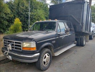 1995 Ford F350 crew cab truck with dump bed
