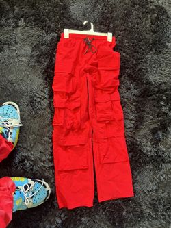 Red cargo pants .