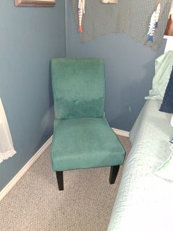 Turquoise Chair With Two Pillows