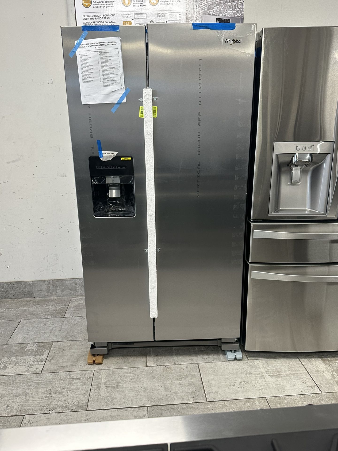 Whirlpool 24.5 Cu.ft Side by Side Refrigerator In Fingerprint Resistant Stainless Steel