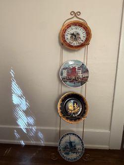 Vintage Brass Display Stand with Collectible Decorative Plates and Clock