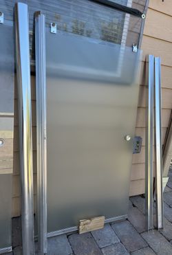 Used kohler glass bathtub door