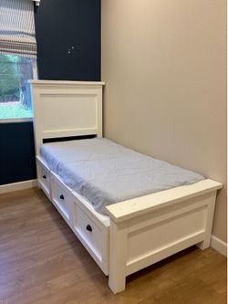 Beautiful custom solid wooden twin bed with memory foam mattress