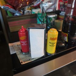 Free seinfeld, salt and pepper shaker.The tip is broken off the I guess salt or pepper.The yellow one