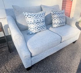 Ashley Loveseat and accent pillows