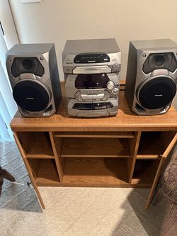 stereo system and oak cabinet