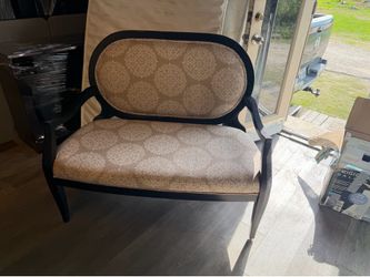 Elegant black wood upholstered loveseat