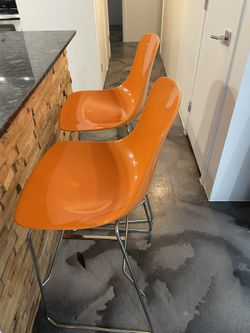 2- Orange Infiniti Bar Stools. Made in italy