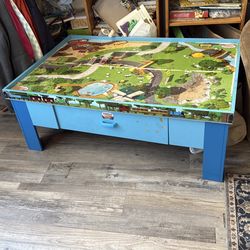 Double sided Thomas the train table with train holder.