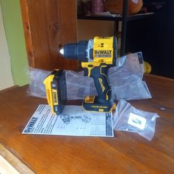 DeWalt 20 v atomic.  Drill driver.   2 speed.  1/2".  W/ battery.   2.0 AH. Lithium