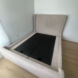 Queen upholstered bed