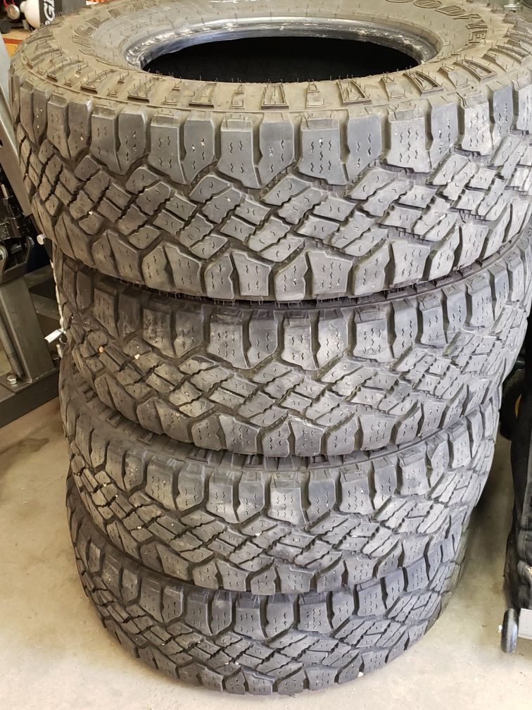 (4) Goodyear Wrangler Duratrac tires 265/70 r16