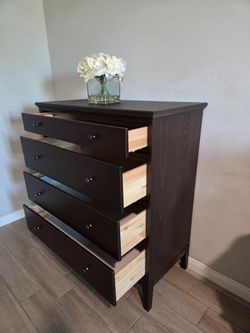 Ikea Wood Dresser. Used, in very good condition. All drawers glide smoothly with a soft close drawer feature.

41"W x 20"D x 47"H 

Decor Not Included