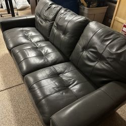 Grey Leather 3 Seater Couch, 2 Ottomans, And Love Seat
