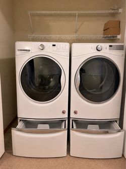 New Front-Load Washer and Dryer Set with Pedestals