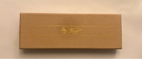 Brand new, in box, Original Penguin by Munsingwear pre-tied bow tie and pocket square