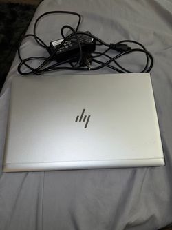 HP Laptop (No Physical Damage) - Powers On, Locked/For Parts + Charger Included