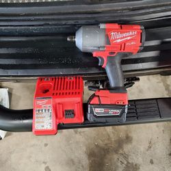 Milwaukee M18 FUEL Impact Wrench With Battery And Charger Used.