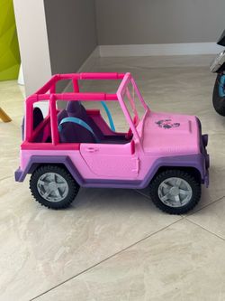 Journey Girls Outback 4-Wheel Vehicle pink and purple toy jeep.