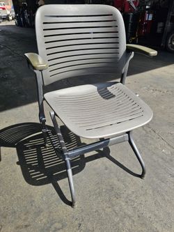 Cachet Chair with Flip Arm Rest