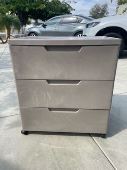 Plastic storage cabinet