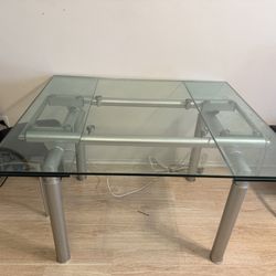 Extending Glass table and 6 chairs (Move out fire sale)