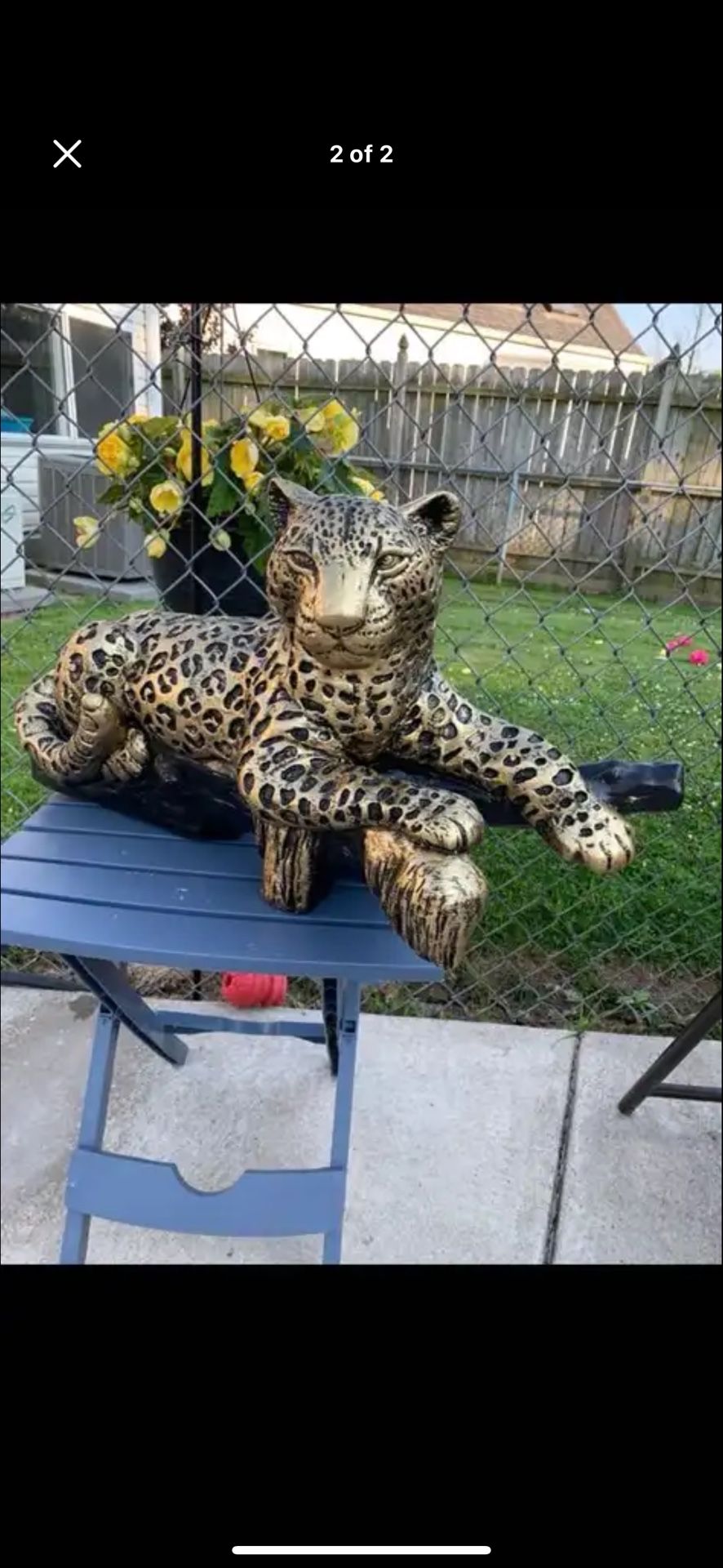 Golden Leopard On The Log Statue