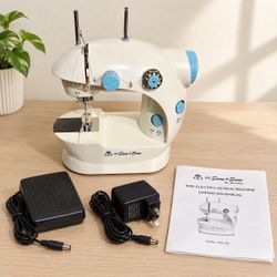 Mini Sewing Machine. Includes Foot Pedal, Power Adapter, 2 Bobbins, Operation Manual