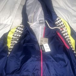 PUMA × LEMLEM Training Anorak Rain...