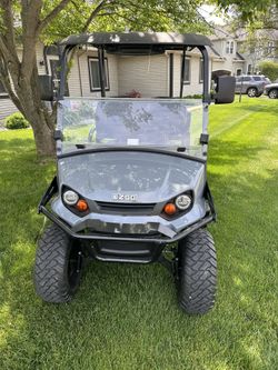 2025 EZGO Express 4 gas golf cart, 13 hp Kawasaki  engine, 4 passenger, lights, windshield!!! 