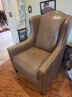 Leather Wing Chair and Ottoman $25