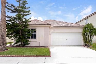 Unit 1544 NW 158th Ave | 4 bd | 2 ba | 1700 sqft | smart home with 24-hours surveillance camera