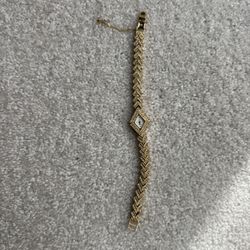 Parmex Ladies Gold Tone Watch with Chevron Links and Faux Rhinestones.